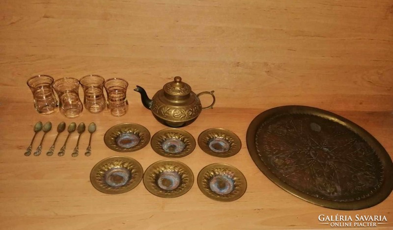 Old copper coffee set with small spoons