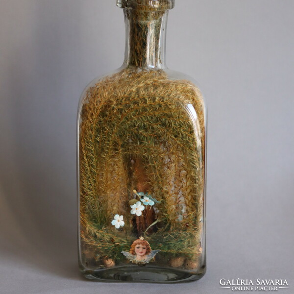 19th century patient glass tweezers in a large size bottle