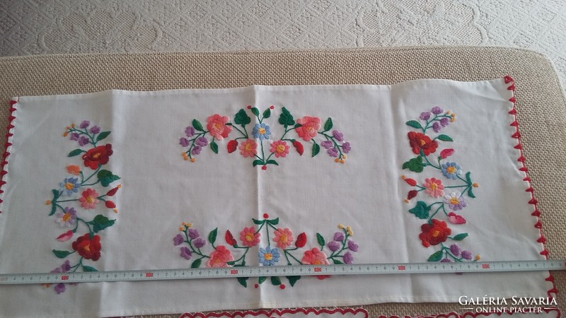 Old embroidered tablecloths together