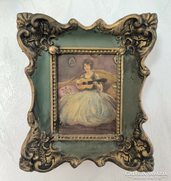 Antique interior painting with lady in blonde frame