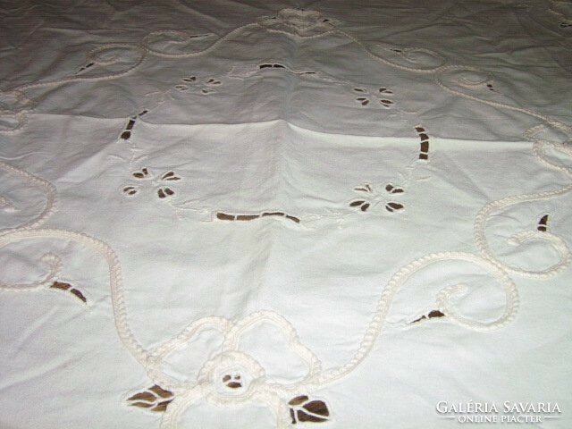 Beautiful ribbon embroidered on a tablecloth