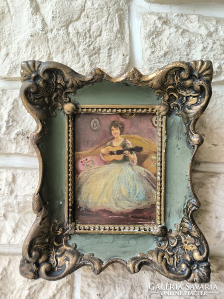 Antique interior painting with lady in blonde frame