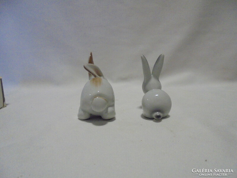 Two porcelain bunny figurines, nipp - together - one from Hóllóháza, the other serially numbered
