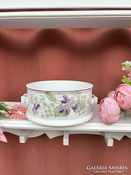 The violet porcelain floral food barrel is a legacy of a grandmother's treasure