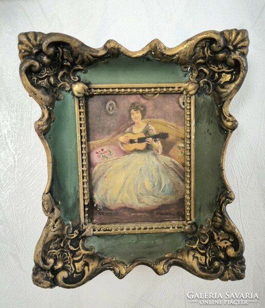 Antique interior painting with lady in blonde frame