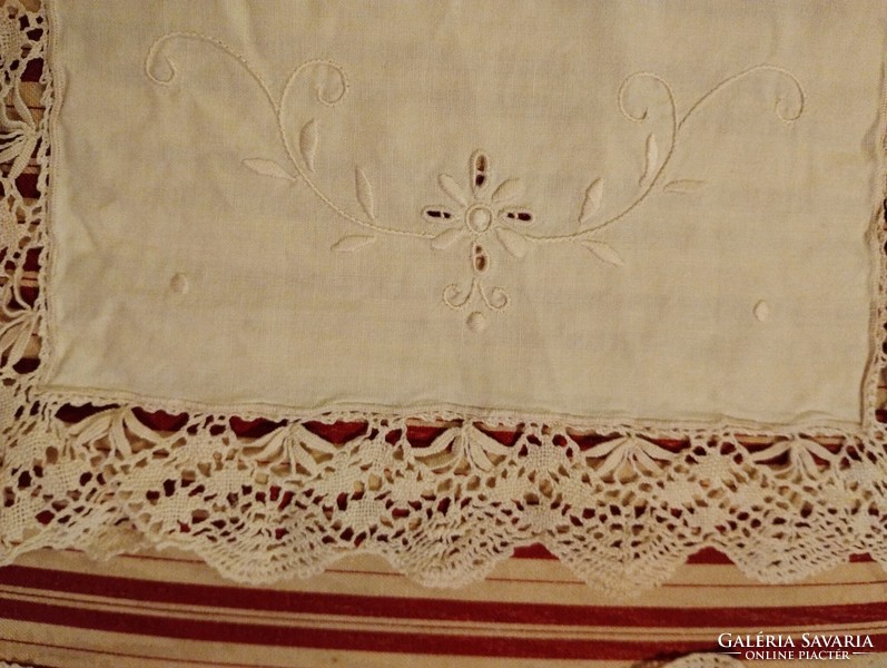 Embroidered lace tablecloths from Burano (island near Venice).