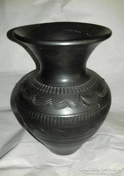 Women's Day 87!- A curious black ceramic vase of folk character