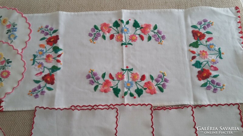 Old embroidered tablecloths together