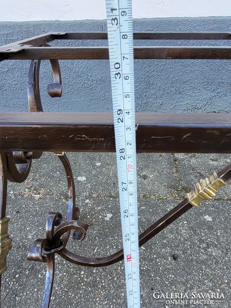 Special, old forged garden table frame with copper elements