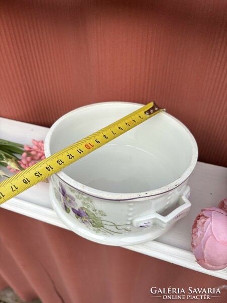 The violet porcelain floral food barrel is a legacy of a grandmother's treasure