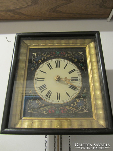 Antique two-weight, 1-day wall clock with glass face