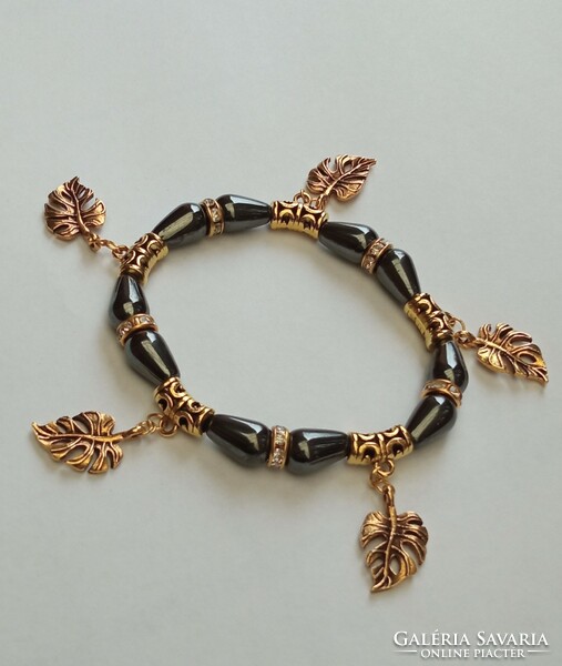 Mineral bracelet - gold-colored philodendron leaf with pendants