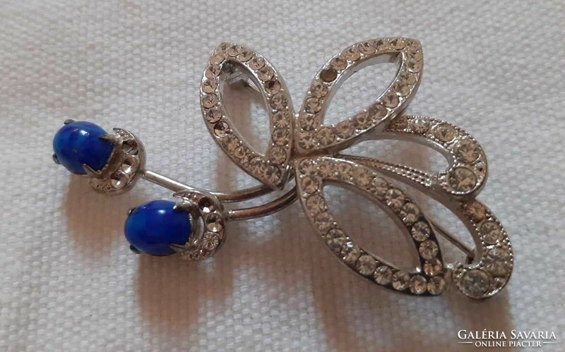 Vintage silver-colored brooch, decorated with a blue mineral stone and white polished glass (stone-like)