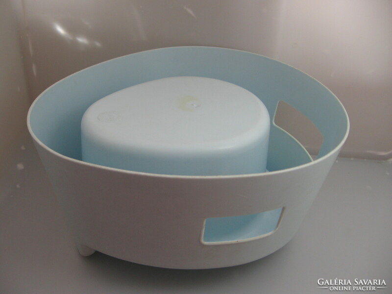 Retro light blue plastic potty