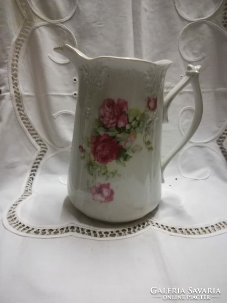 Pink porcelain jug, spout, with damage on the spout