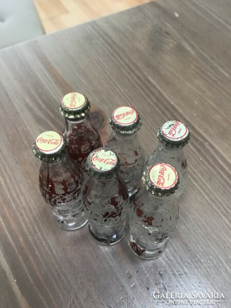 Régi miniatűr Coca-Cola üveg fém kupakkal, 6db.