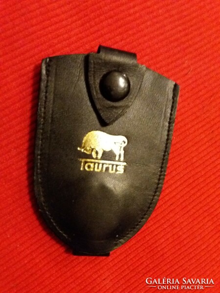 Old taurus rubber factory leather patent hideable key holder in good condition as shown in the pictures