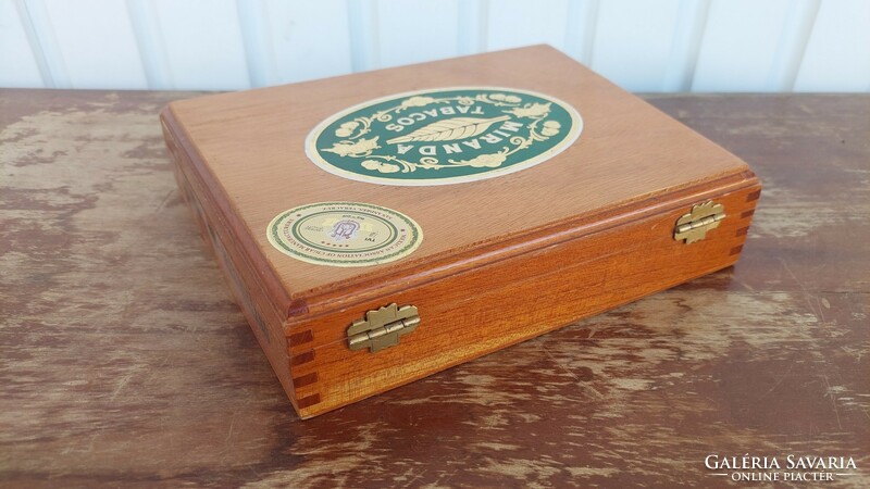 Wooden cigar box with cigar cutters