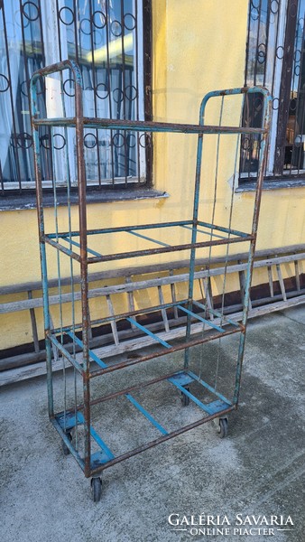 Rolling metal shelves