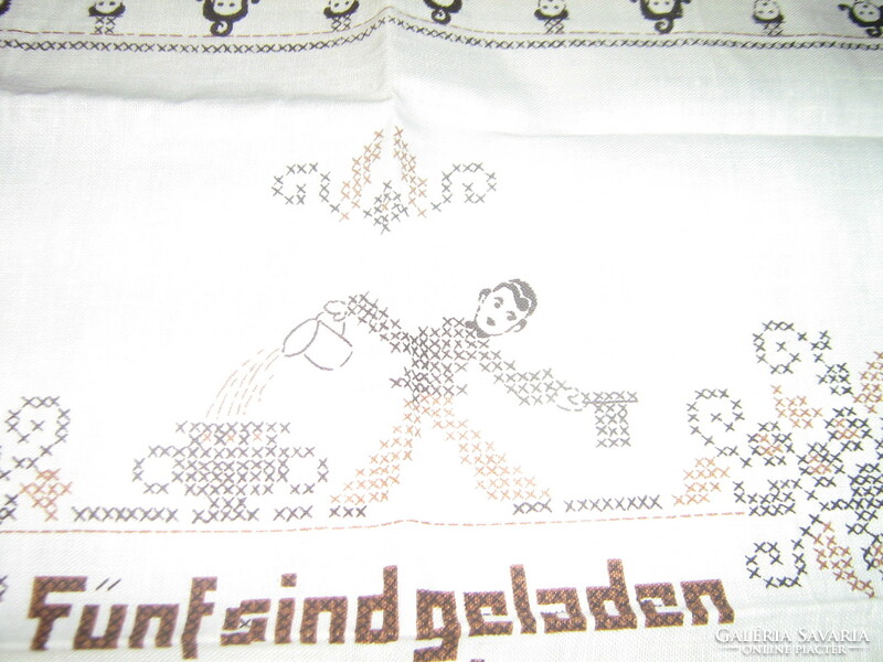 A napkin with a charming inscription in German with a cross-stitch pattern (can also be embroidered).