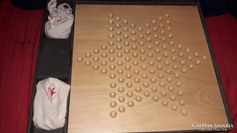 Released by the German pharmaceutical company pohl boskamp, a wooden board game with balls, a perfect rare game