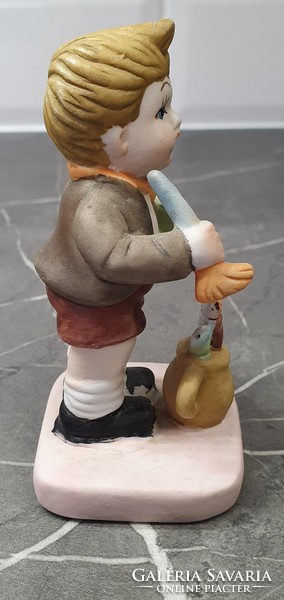 Painter boy ceramic figure