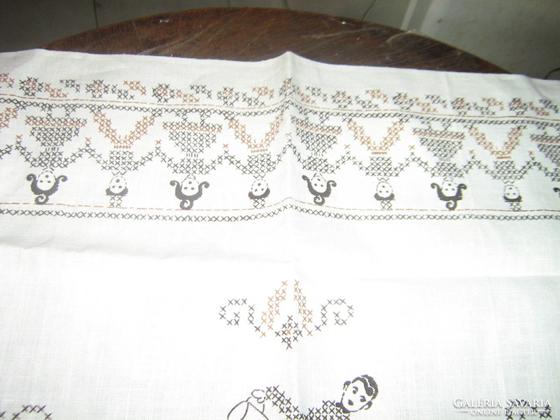 A napkin with a charming inscription in German with a cross-stitch pattern (can also be embroidered).