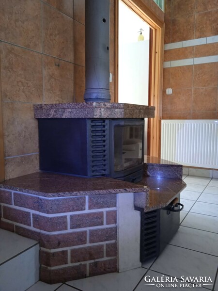 Fireplace, unique, made of mobilizable elements, rolling wood storage, acid flue, with console, etc.