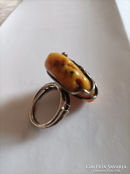 Handmade silver ring with butter amber.