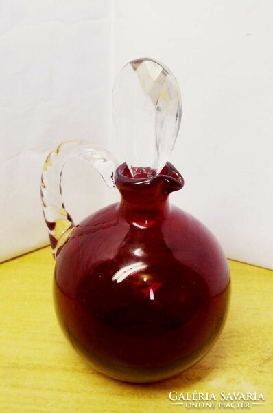 Bohemia wine-red elixir jug with cut crystal stopper, a collection piece