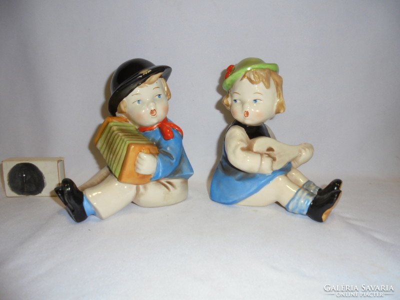 Pair of antique ceramic bookends - boy and girl playing music - hand painted, numbered, marked