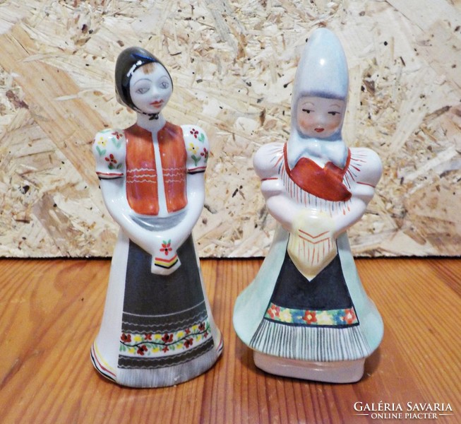 Porcelain and ceramic figurines in folk costume