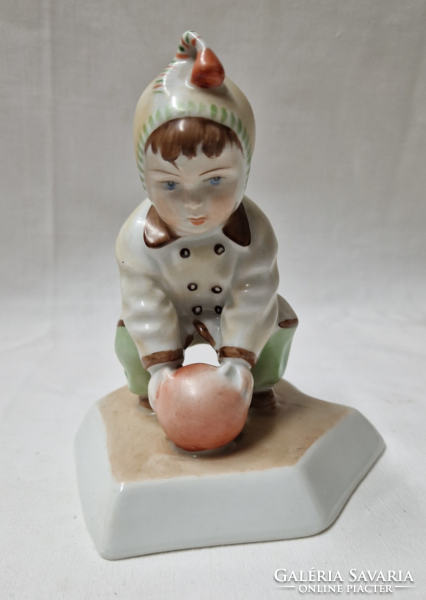 Porcelain figurine of Zsolnay ball boy or child designed by András Sinkó in perfect condition 14 cm.