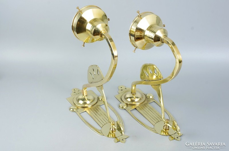 A pair of Art Nouveau wall arm lamps