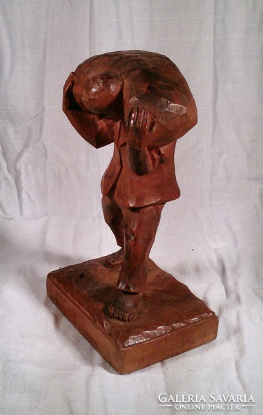 Sculpture sculpture with a man's bag