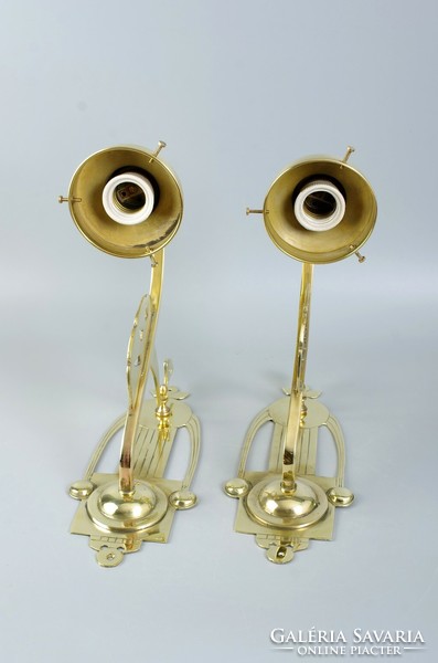 A pair of Art Nouveau wall arm lamps