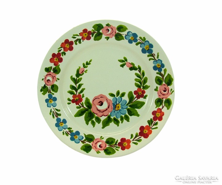 Marked granite wall decorative plate with floral folk motif