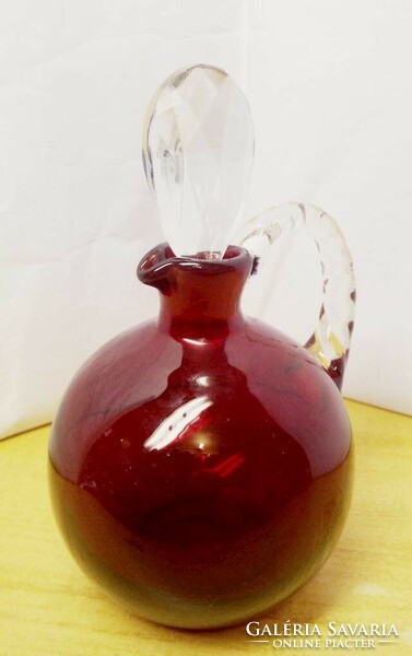 Bohemia wine-red elixir jug with cut crystal stopper, a collection piece