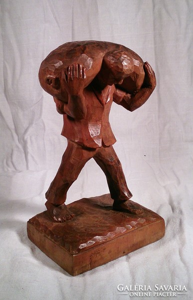 Sculpture sculpture with a man's bag