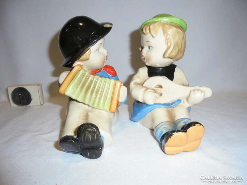 Pair of antique ceramic bookends - boy and girl playing music - hand painted, numbered, marked