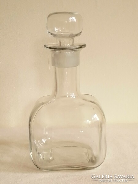 Old square molded glass bottle with pouring glass stopper