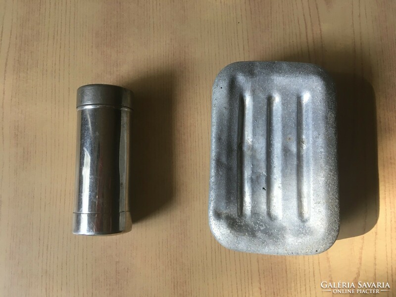 Old metal soap holder and cylindrical storage for toilet paper