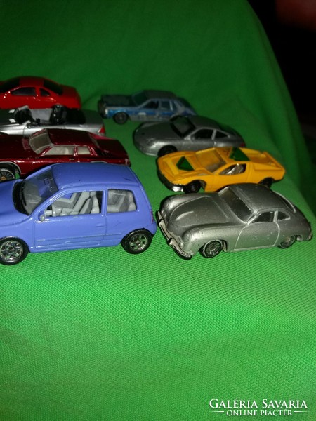 Old toy car package in good condition with 12 metal and plastic toy cars as shown in the pictures