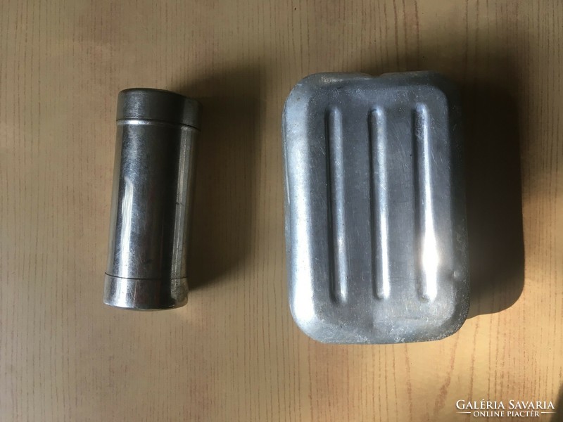 Old metal soap holder and cylindrical storage for toilet paper