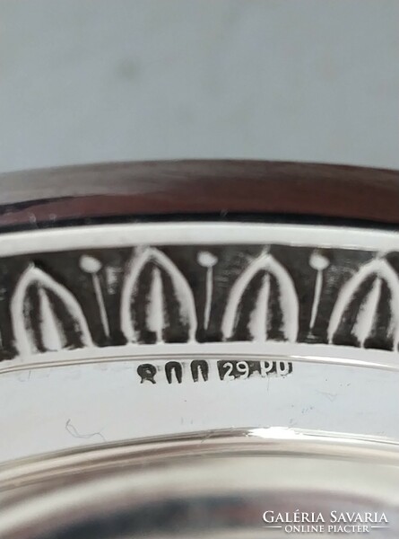 Silver offering bowl standing on lion's feet