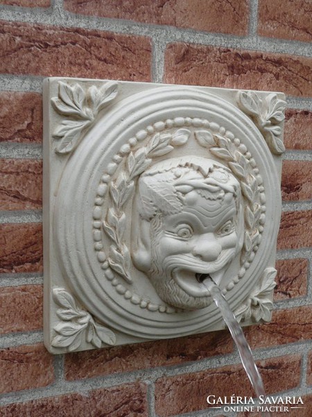 Ancient Greek gargoyle, wall fountain