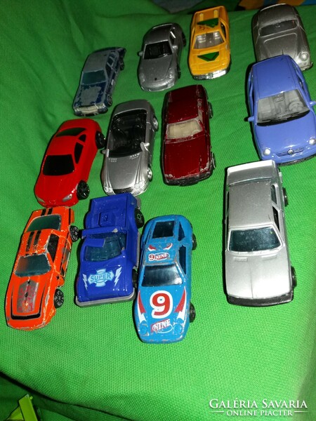 Old toy car package in good condition with 12 metal and plastic toy cars as shown in the pictures