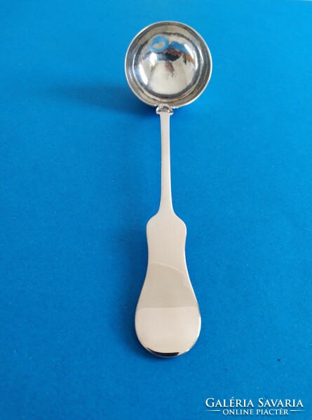 Silver ladle in violin style
