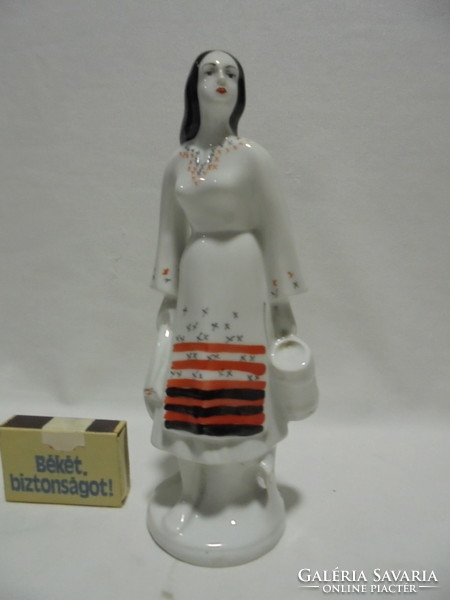 Girl with a jug - porcelain figurine, nipp