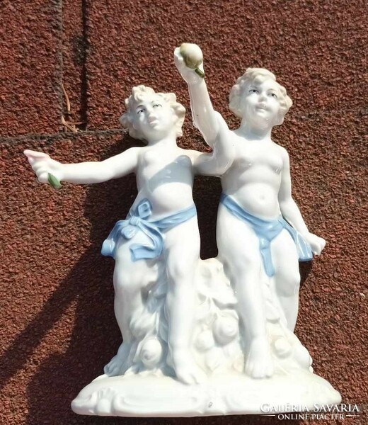 Pair of old German crown stamped baroque porcelain children